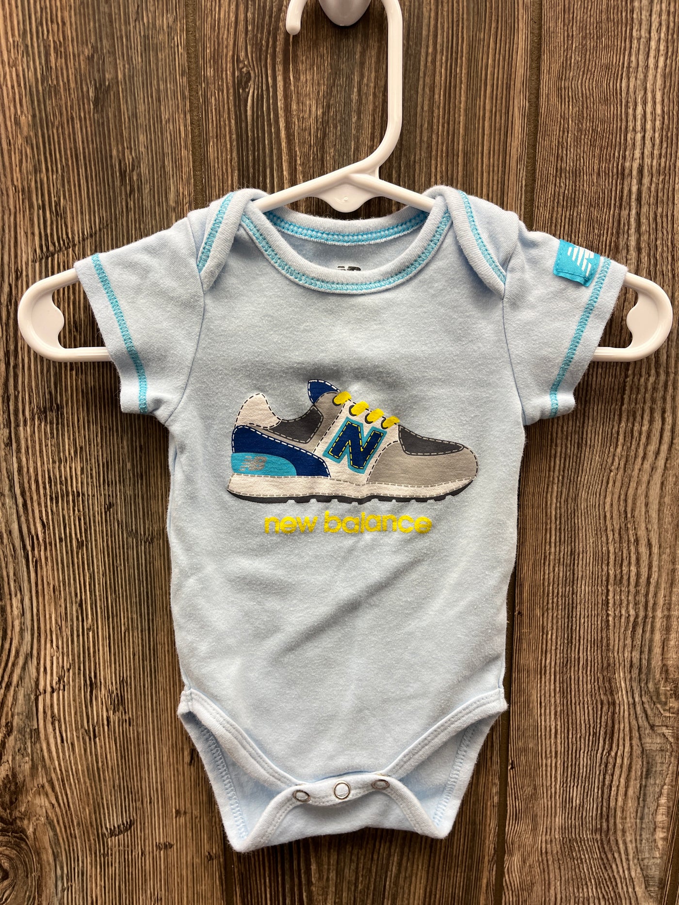 Boys 0-3 mo Blue New Balance Onesie with Shoe