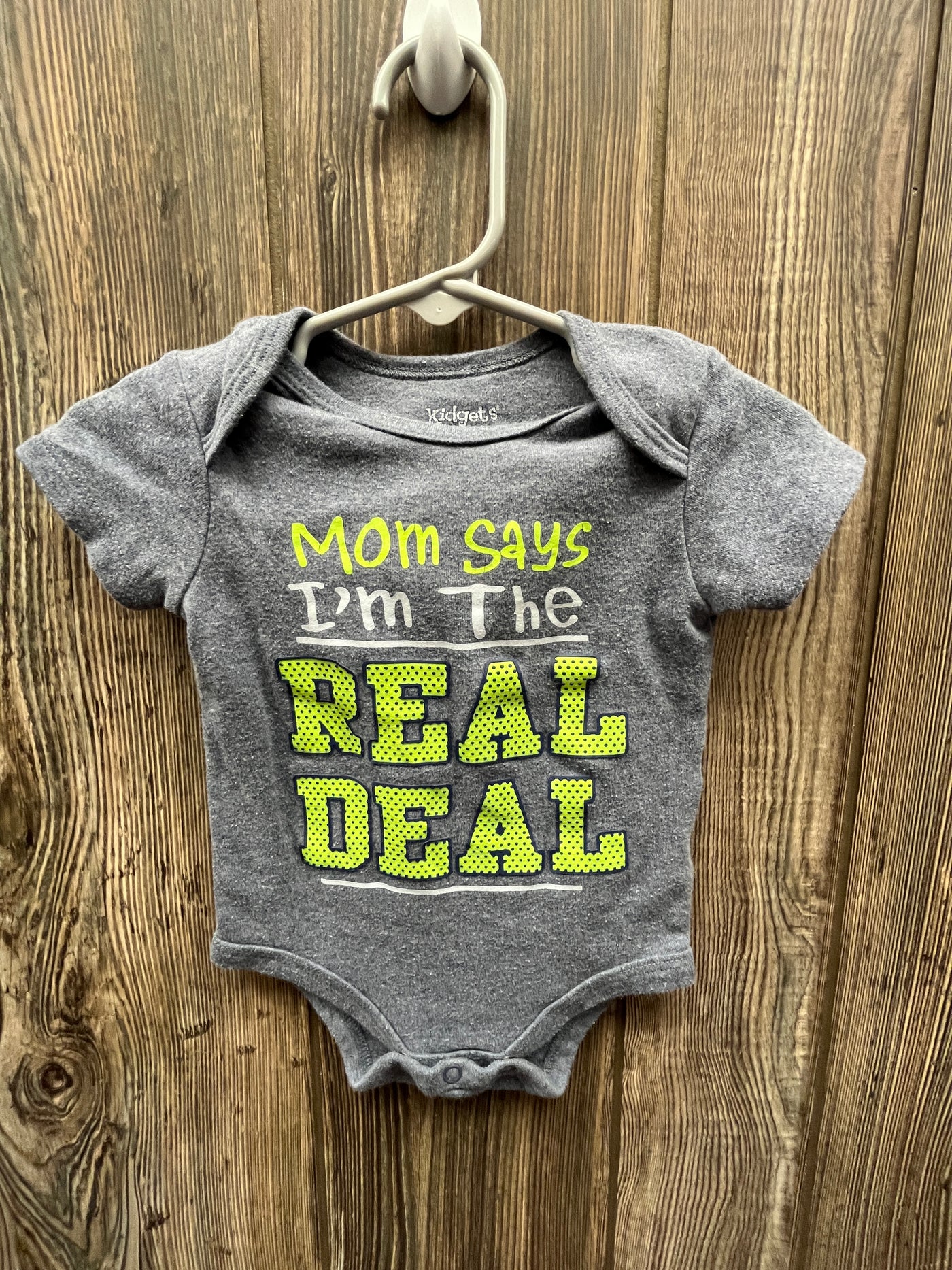 Boys 0-3 mo Mom Says Im the Real Deal Short Sleeve Onesie